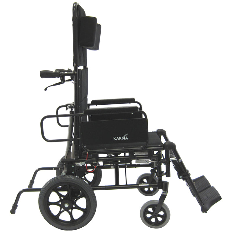 Adjustable headrest and padded armrests on KM-5000-TP wheelchair